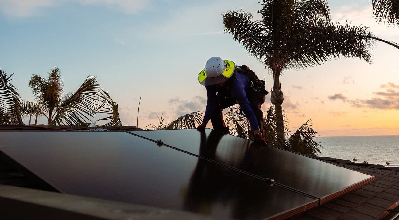 Home with roof and solar panels